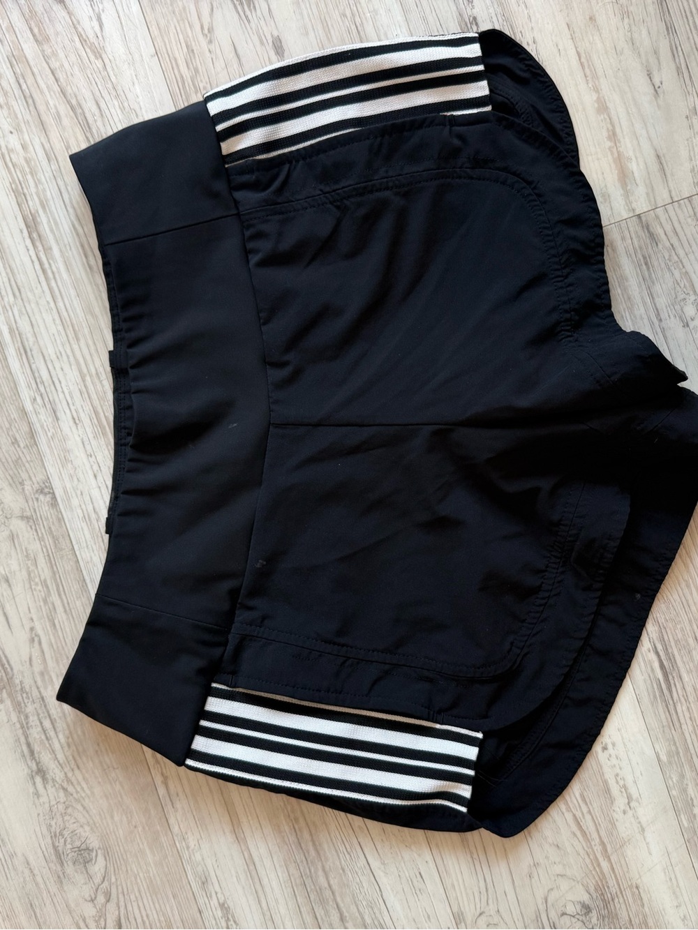 Athleta Black Athletic Shorts with White Striped Detail